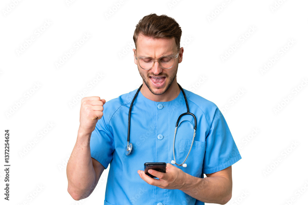 Young nurse man over isolated chroma key background with phone in victory position Young nurse man over isolated chroma key background with phone in victory position
