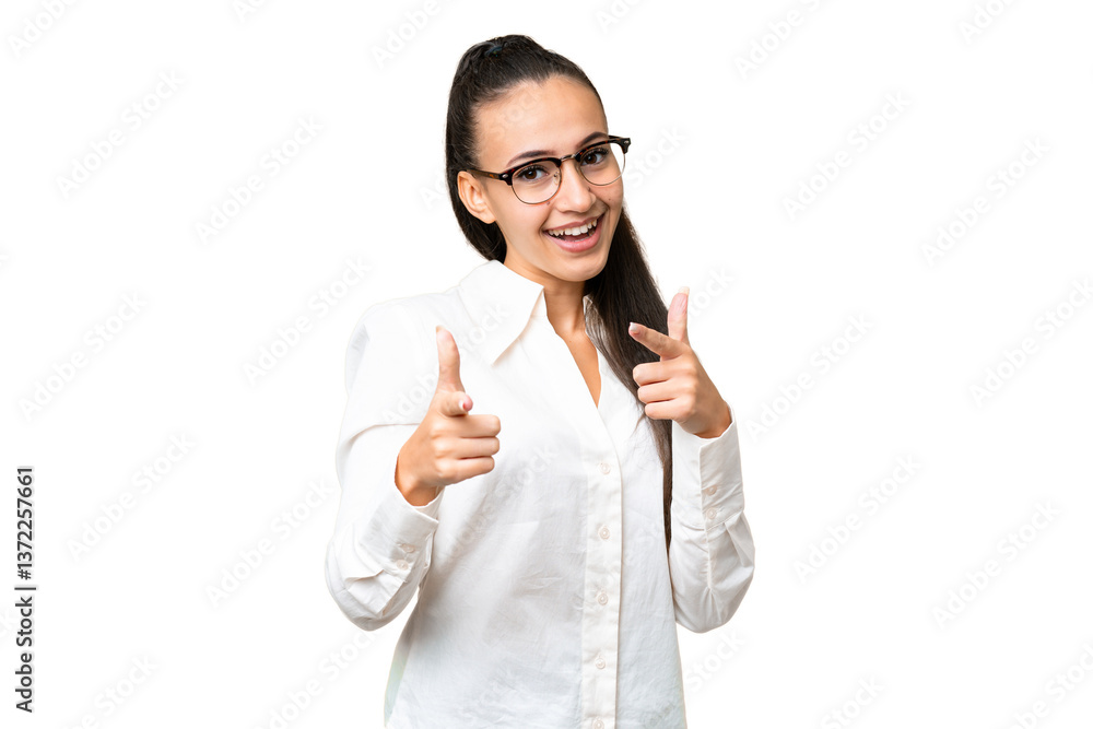 Young Arabian woman over isolated chroma key background surprised and pointing front Young Arabian woman over isolated chroma key background surprised and pointing front