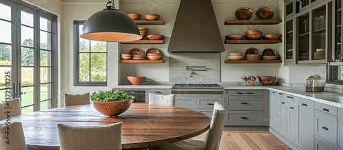 Obraz na płótnie Farmhouse Kitchen with Round Table and Open Shelving w salonie