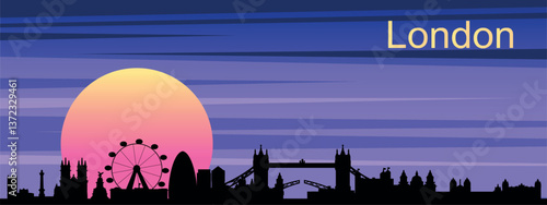 Silhouette of the evening skyline of London against the sunset