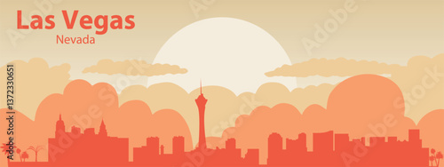 the silhouette of the city of Las Vegas, Nevada against the backdrop of the sunset with clouds in the sky.