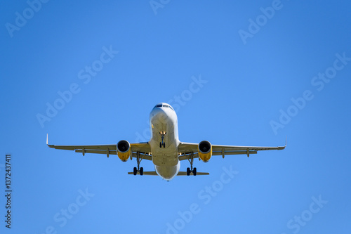 Vueling Landing at BCN airport during a sunny day