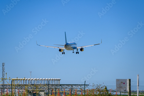 Vueling Landing at BCN airport during a sunny day