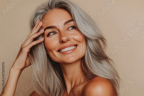 Elegant mature woman with radiant smile and grey hair, exuding joy. Generated AI