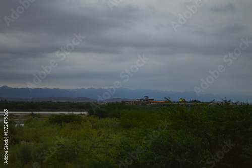 time lapse clouds over the river evening landscape background photo