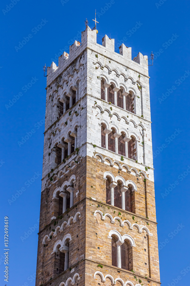 Tower of the historic Duomo cathedral in Lucca, Italy