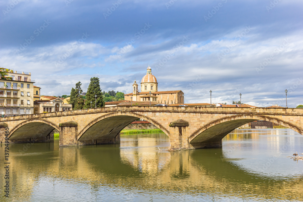 Historic bridge in front of the San Frediano church in Florence, Italy