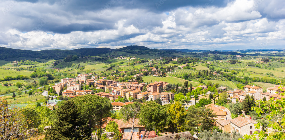 Panoramic view over houses and landscape of San Gimignano, Italy