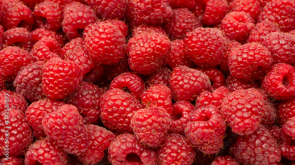 Tasty fresh raspberry as a background. Tasty fresh raspberry as a background.