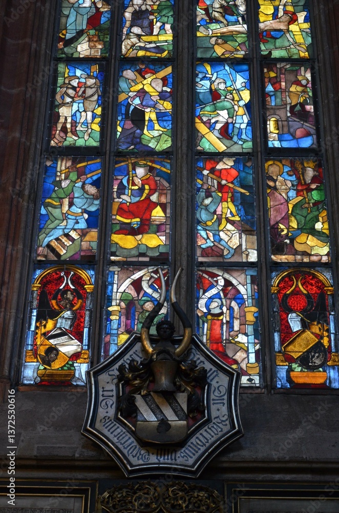 Nuremberg, Germany 10.16.2019: Stained glass of St. Lorenz (St. Lawrence), a medieval Evangelical Lutheran Church Nuremberg, Germany 10.16.2019: Stained glass of St. Lorenz (St. Lawrence), a medieval Evangelical Lutheran Church