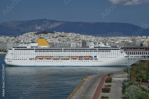 Obraz na płótnie Classic cruiseship or cruise ship liner Neo Riviera in Piraeus Athens, Greece port on sunny day blue sky during Mediterranean Aegean Greek islands summer cruising dream vacation w salonie