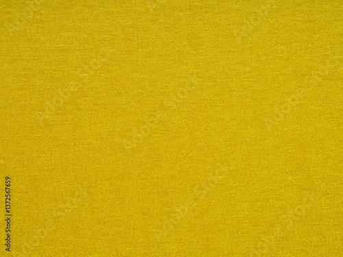 Obraz na płótnie A sweep of mustard yellow brings a paper texture to life, exuding warmth, energy, and creative flair w salonie