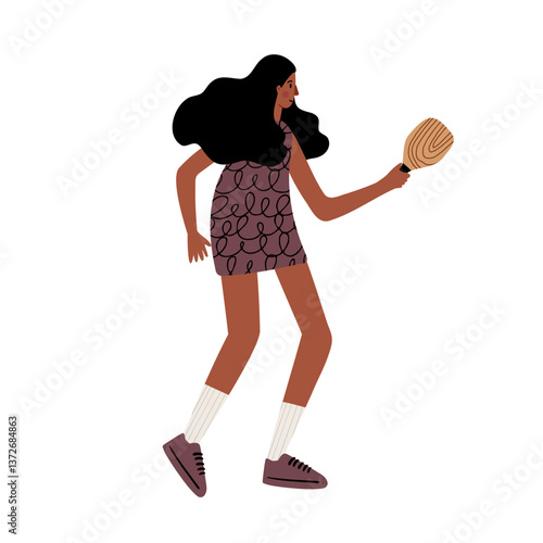 African American young woman with long dark hair holding a wooden racket. She wears a short patterned dress, socks, and sneakers. She appears ready to play. Flat vector illustration.