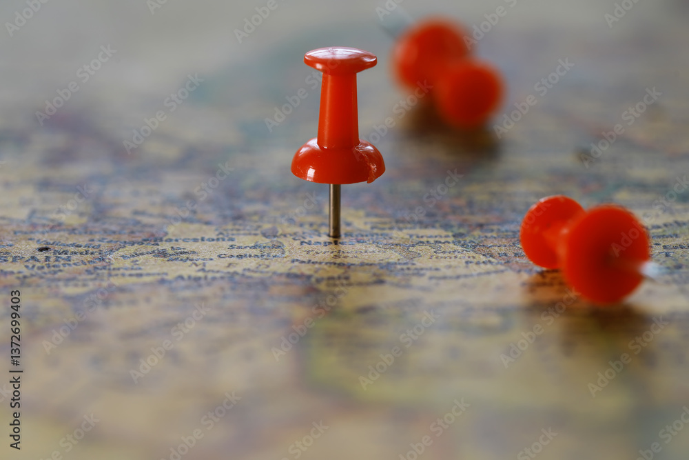 Red Push Pin on Map Highlighting Travel Destination and Planning Route Red Push Pin on Map Highlighting Travel Destination and Planning Route