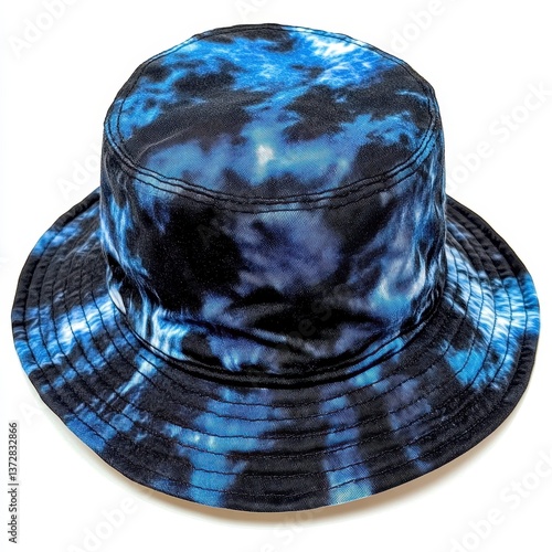Top-down view of an isolated blue and black tie-dye bucket hat with a visible brim, presented on a clean white background.