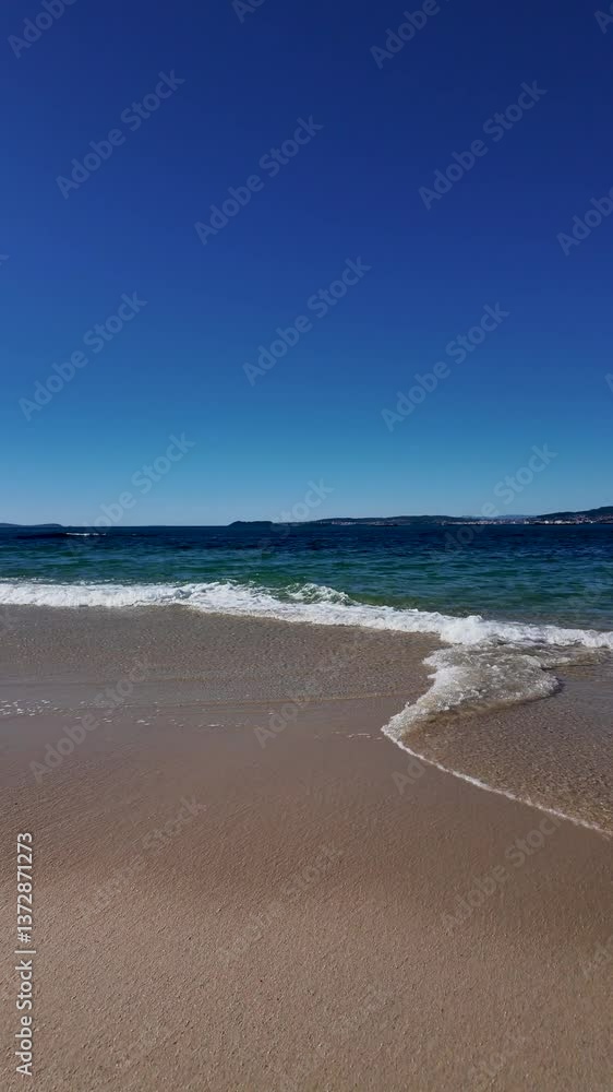 Serene Beach with Tranquil Clear Waters and Sand in Bueu Serene Beach with Tranquil Clear Waters and Sand in Bueu