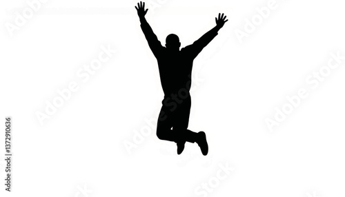 Joyful silhouette of a person jumping in excitement in a bright, empty space