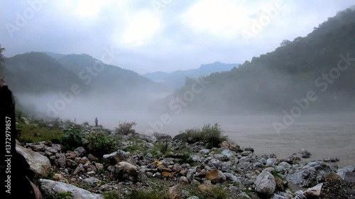 Rishikesh time lapse during monsoon with clouds on the river ganga in India