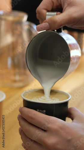 The barista makes coffee, grinds coffee in a coffee grinder, pours espresso, whips milk with a steamer, pours cappuccino and latte with a heart. The coffee machine is making an espresso. Failure