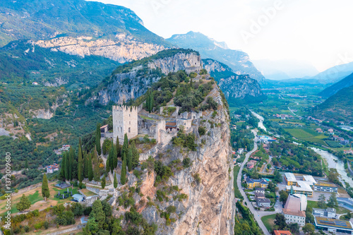 Arco Castle ruined castle located on a prominent spur high above Arco and the Sarca Valley in Trentino. Aerial view