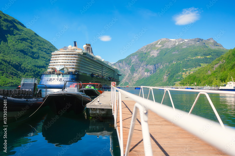 Cruise ship in the fjord. Geiranger Fjord, Norway. Traveling on a Norwegian fjord. Scandinavia. Vacation and travel in summer Norway. Background, wallpaper, postcards.