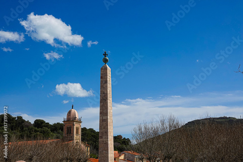 Obraz na płótnie obelisk and roof of church of historic site. Port-Vendres, Occitanie, France w salonie