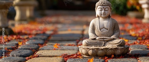 Buddha statue on a stone path