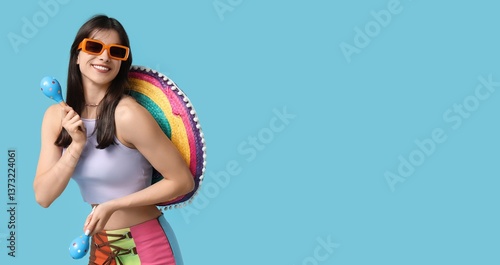 Young woman with sombrero p...