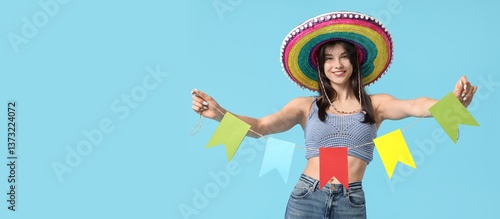 Young woman in sombrero hol...