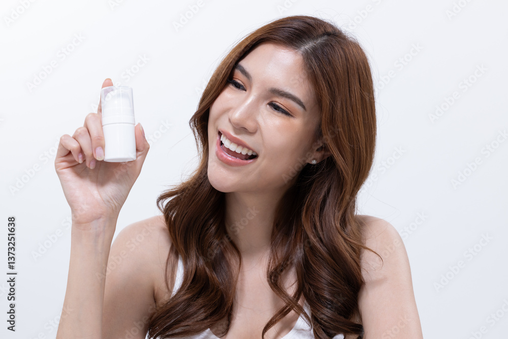 Smiling woman with skincare products on table Smiling woman with skincare products on table