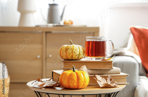 Glass cup of hot tea with p...
