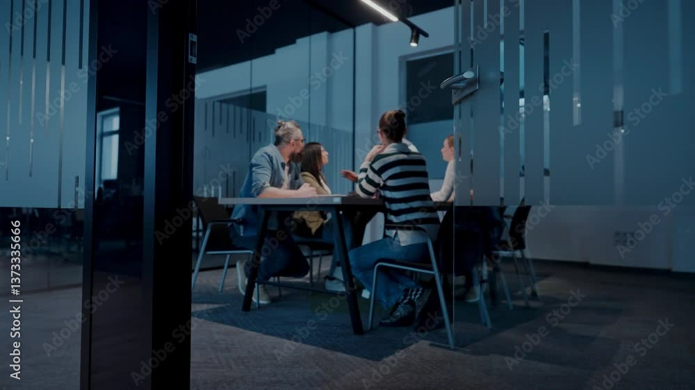 In a sleek glass office space, a team of business professionals engage in lively discussions and exchange strategic ideas, showcasing collaboration and innovation at the heart of modern corporate In a sleek glass office space, a team of business professionals engage in lively discussions and exchange strategic ideas, showcasing collaboration and innovation at the heart of modern corporate