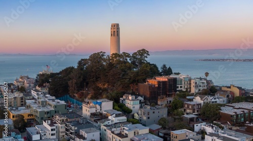 Photography Coit Tower stands tall over San Francisco, California, USA, at sunset