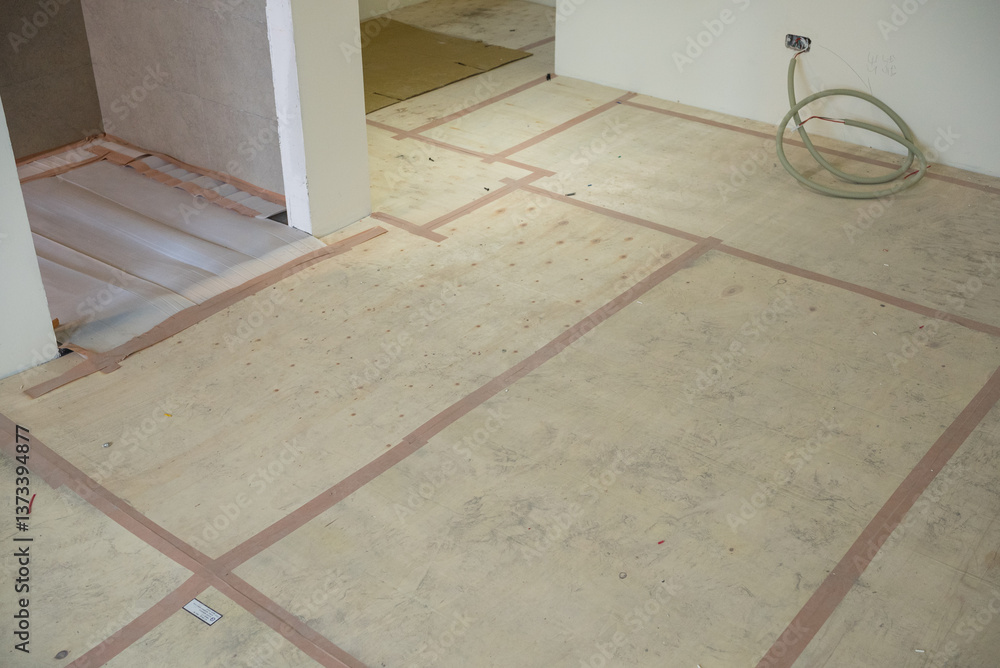 Unfinished flooring in apartment during renovation