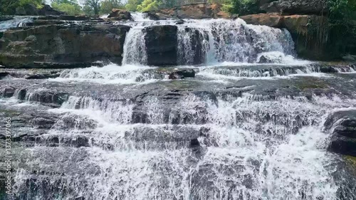 Wallpaper Mural An aerial view showcasing a spectacular Tad Lo Waterfall amid a lush forest, Laos Torontodigital.ca