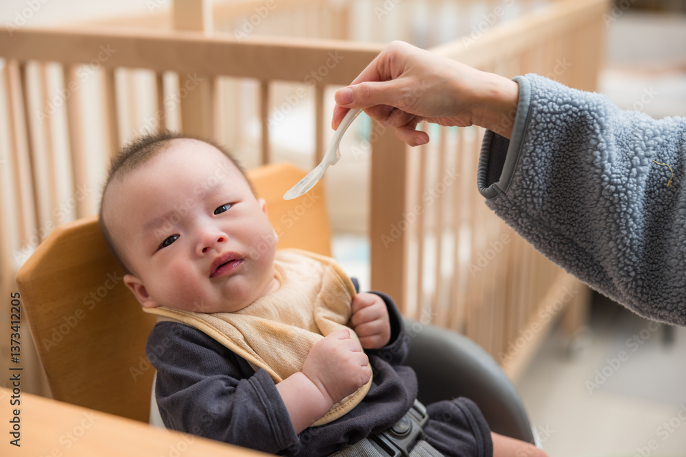 Baby refusing to eat solid food at home