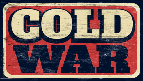 Aged and worn cold war sign on wood