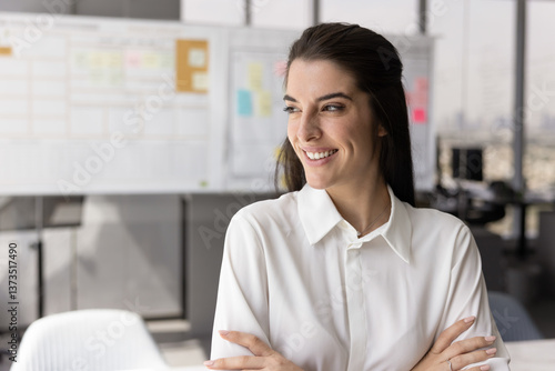 Happy confident successful young Latin manager standing in office with hands folded, looking at copy space away, smiling, thinking on successful project, creative ideas, decision for startup Free Download Happy confident successful young Latin manager standing in office with hands folded, looking at copy space away, smiling, thinking on successful project, creative ideas, decision for startup - GFXLoad