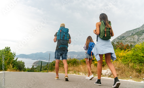Obraz na płótnie Friendship, travel, vacation, summer and people concept. Group of smiling friends with map traveling w salonie
