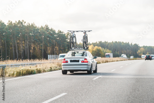 Wallpaper Mural Car driving on highway with bicycles Torontodigital.ca