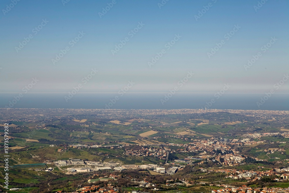 Landscape from San Marino with Rimini town and Adriatic sea in the background, Italy, Europe Landscape from San Marino with Rimini town and Adriatic sea in the background, Italy, Europe