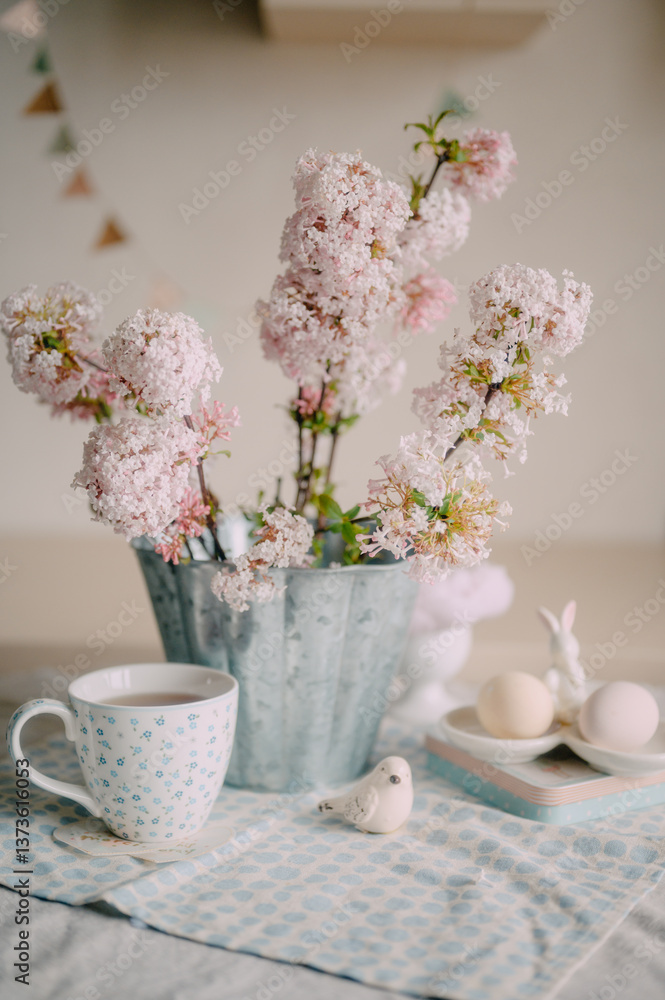 Easter Table Setting with Pink Lilac Flowers and Decorations Easter Table Setting with Pink Lilac Flowers and Decorations