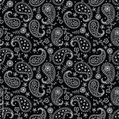 White paisley motifs on black seamless vector pattern