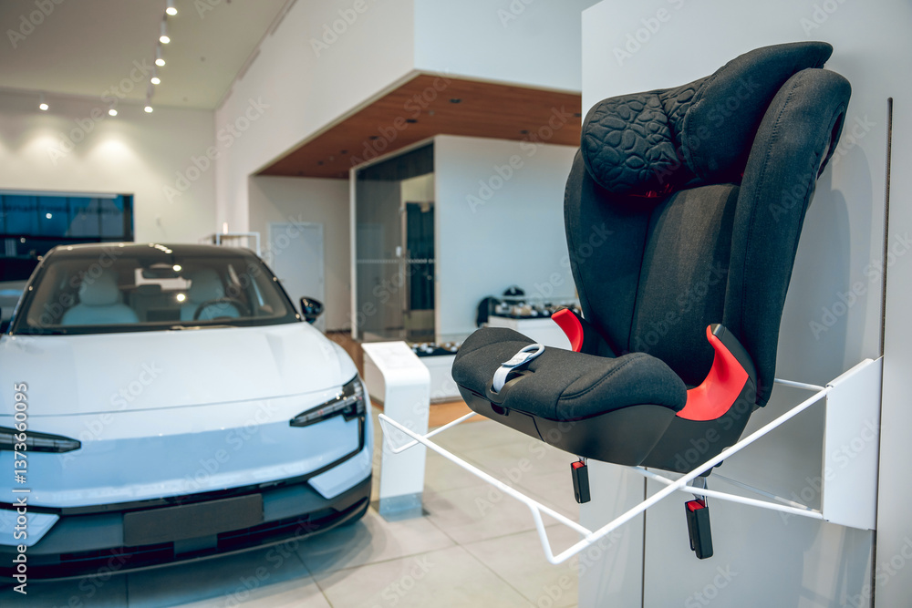 Fototapeta premium Baby seat on display in car dealership