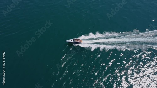 Wallpaper Mural Luxury Grey Speed Boat in Italy: 4K Aerial Drone Video of a Big Motorboat Cruising Fast Over Dark Water Torontodigital.ca