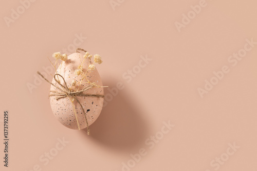 Obraz na płótnie Easter chicken pink eggs decorated white gypsophila flowers on beige pink nude background. View from above. Minimal concept. Copy space. w salonie