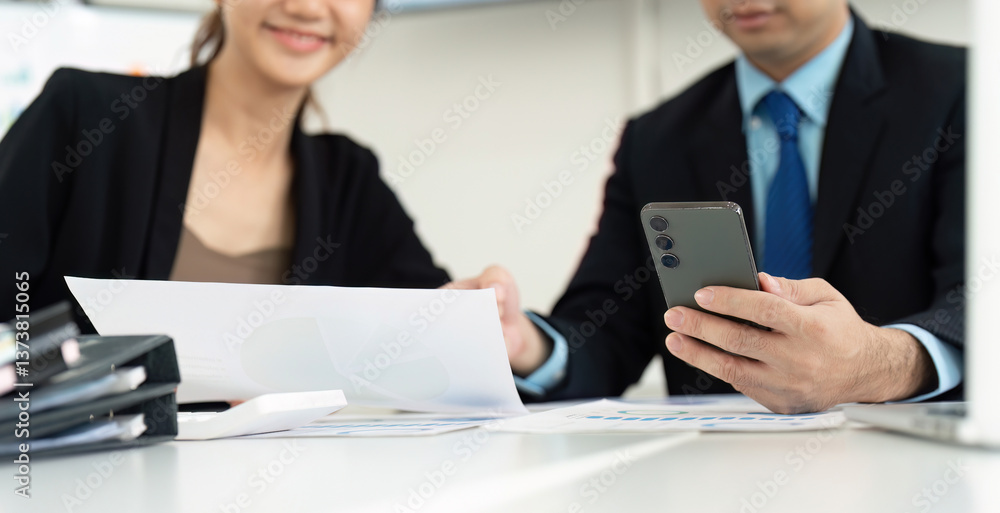 Collaboration and Communication. Professionals discussing business strategies and ideas during a meeting. Collaboration and Communication. Professionals discussing business strategies and ideas during a meeting.