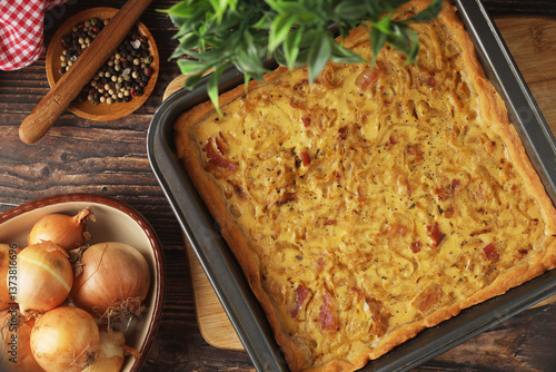 Obraz na płótnie Zwiebelkuchen, a pie with onion and bacon, traditional German dish w salonie