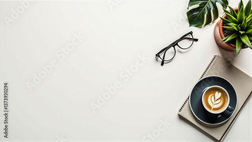 A white background with a cup of coffee and a pair of glasses. The coffee cup is on a napkin and the glasses are on a table