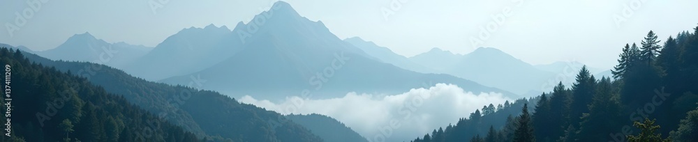 Fototapeta premium Majestic misty mountain peaks rise above a dense woodland shrouded in fog, mysterious, nature
